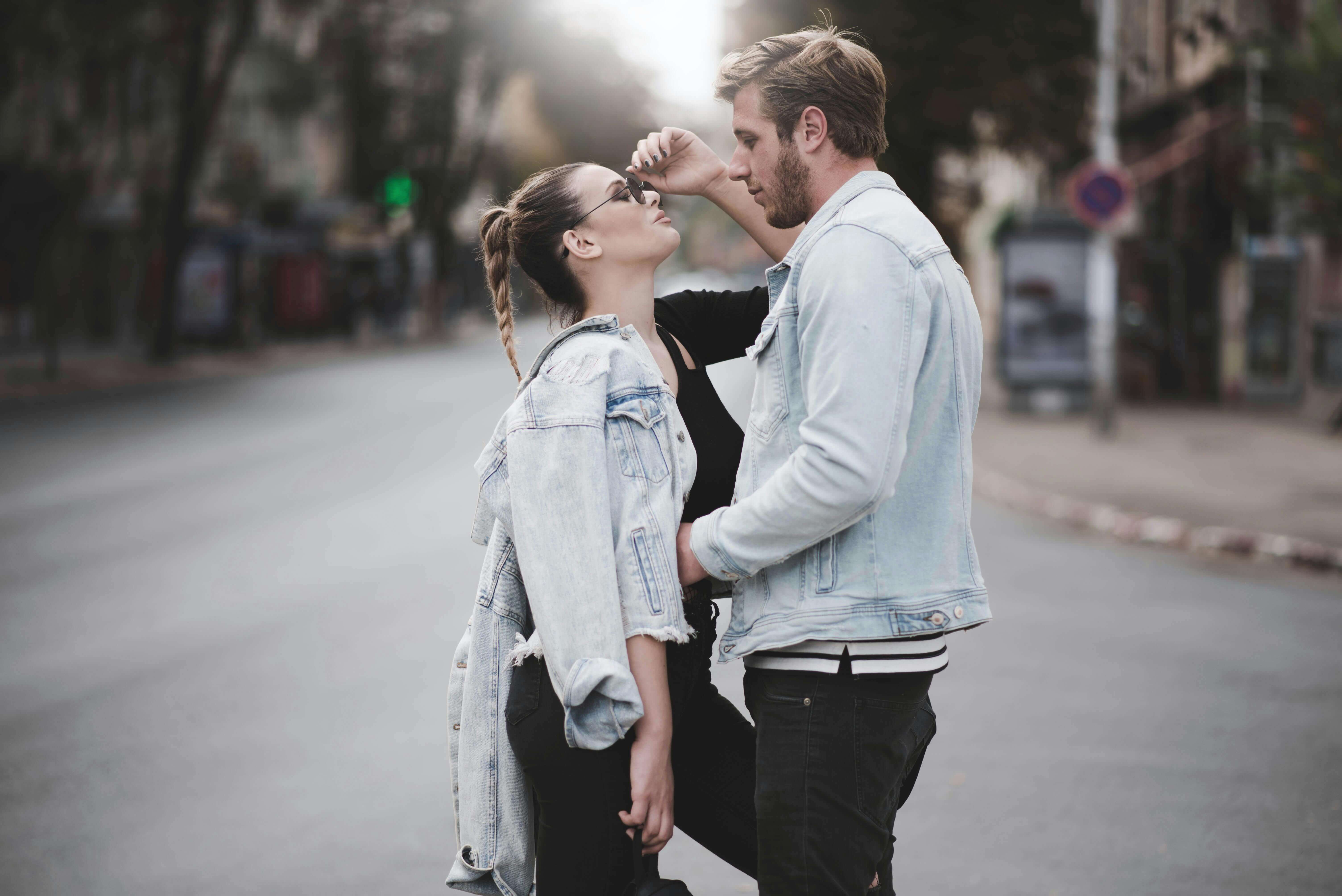 Romantic young couple embracing on a city street in Skopje, Macedonia.